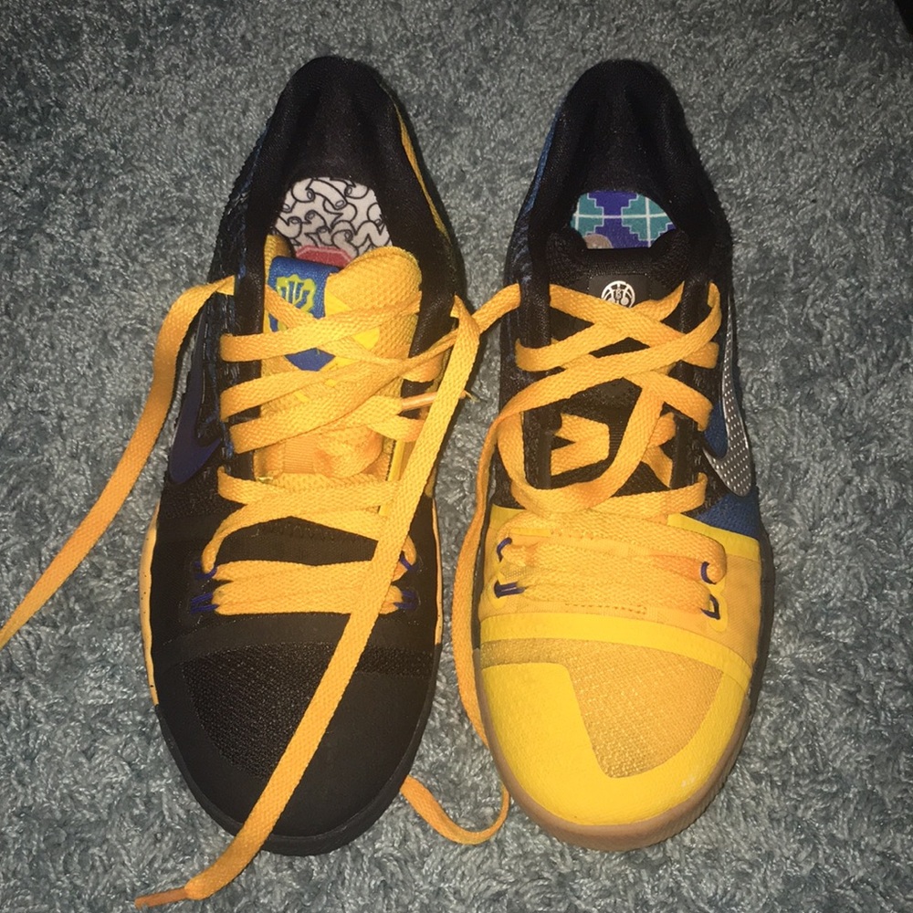 Kyrie Irving kids size 5.
